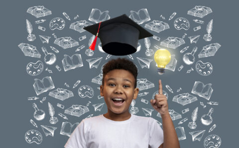 front-view-boy-portrait-with-graduation-background 2