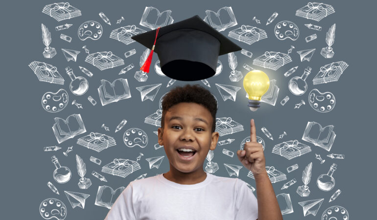 front-view-boy-portrait-with-graduation-background 2